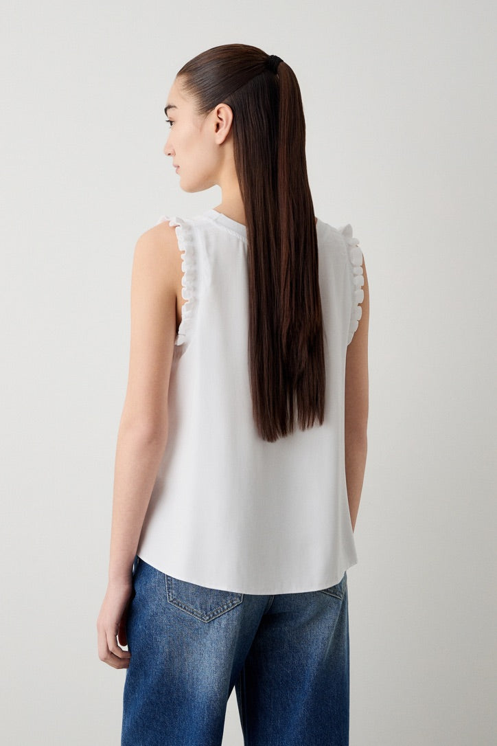 Top with frills on the sleeves white