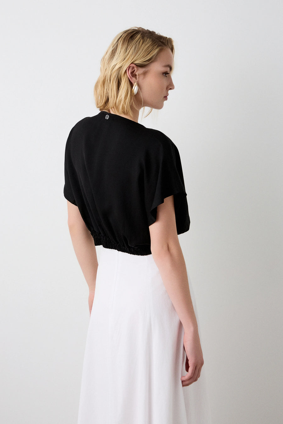 Crop top with short sleeves and pleats
