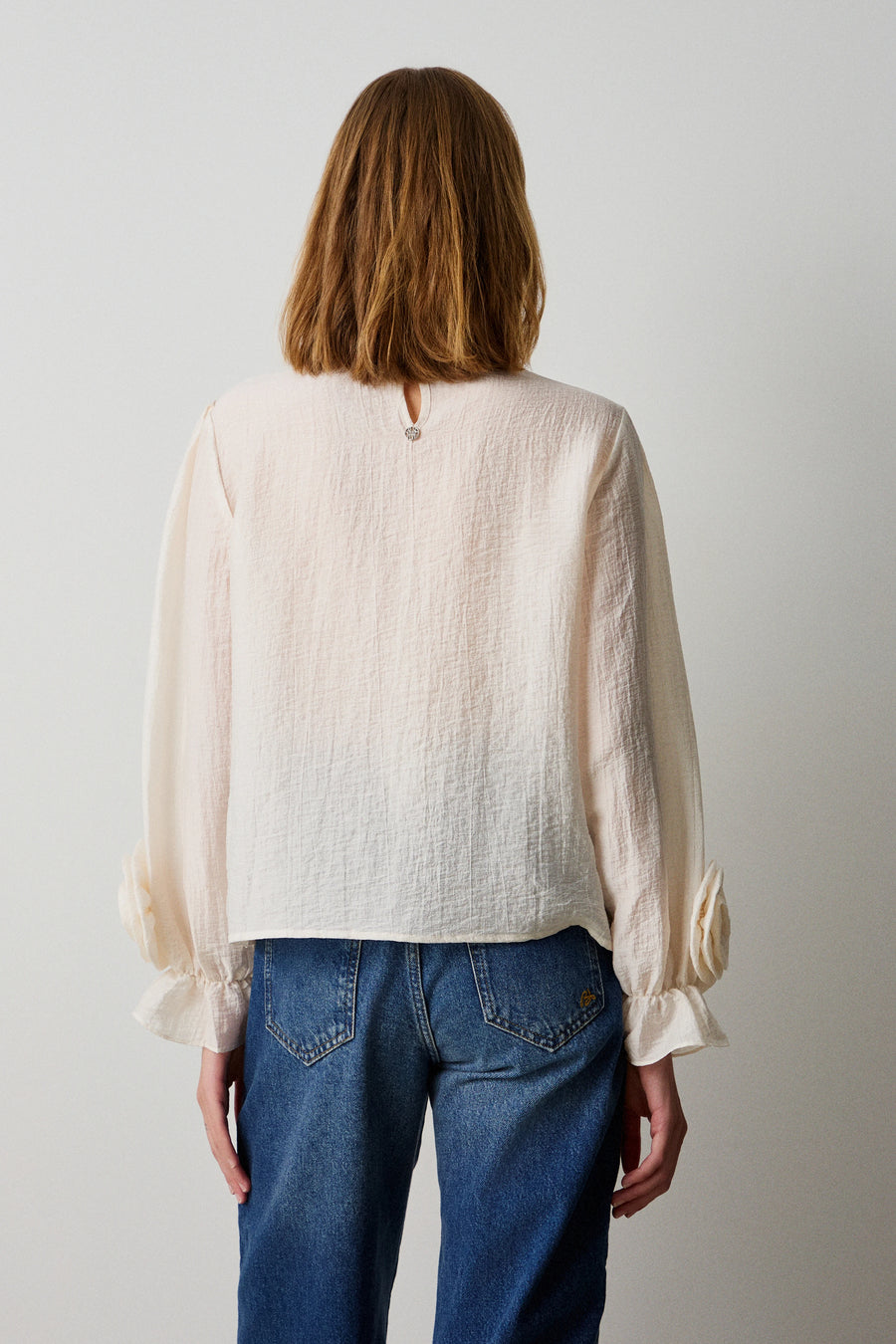 Long sleeves blouse with applique flowers