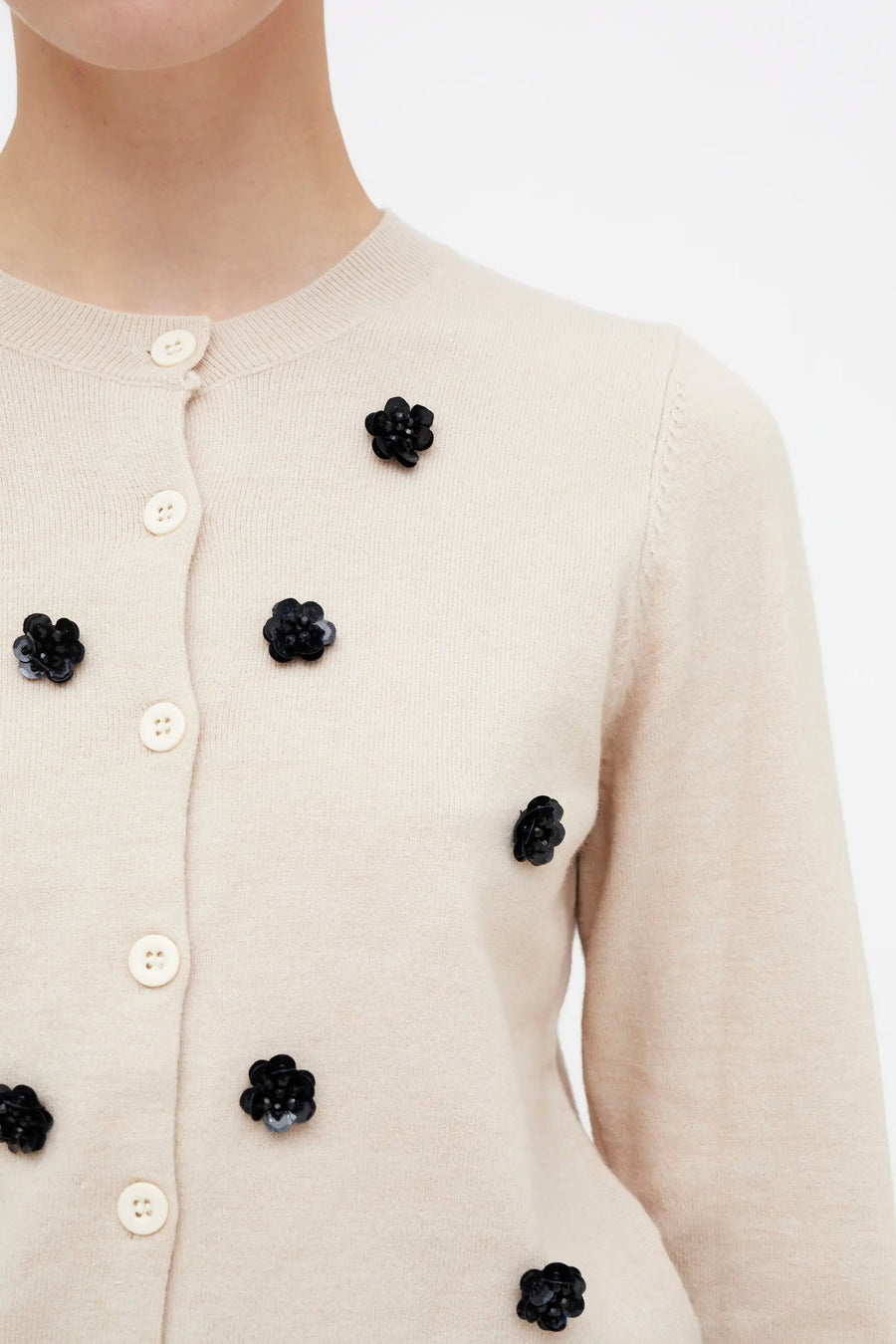 White knit cardigan with sequin flowers